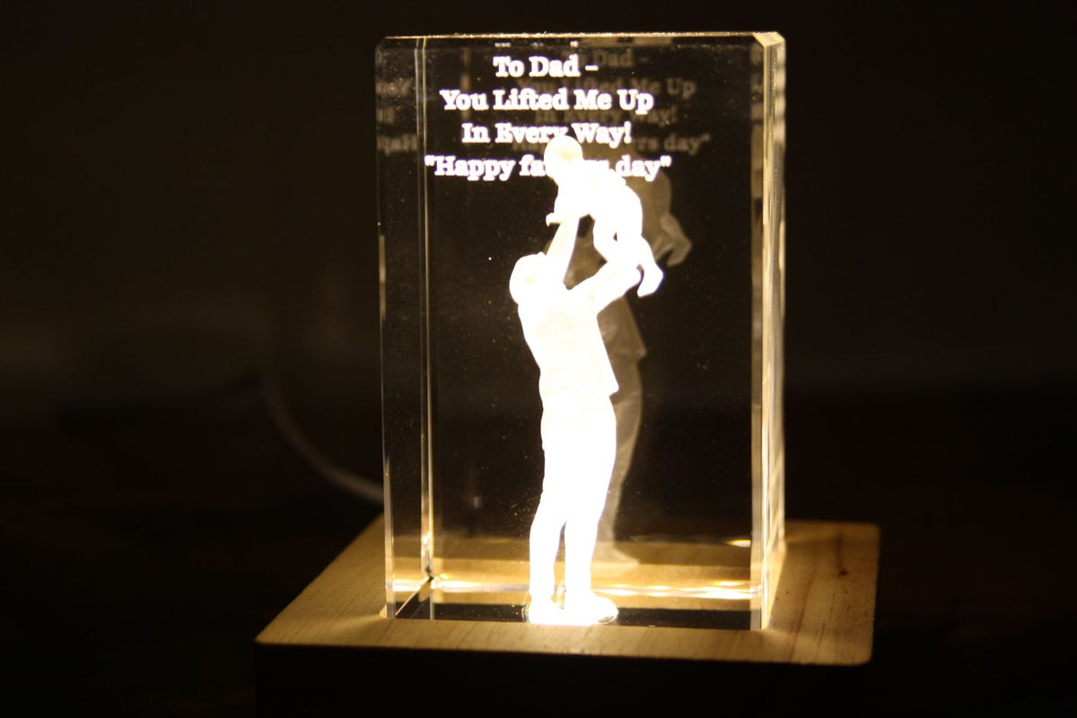 Photo of a dad and child engraved in crystal with a Father's Day message