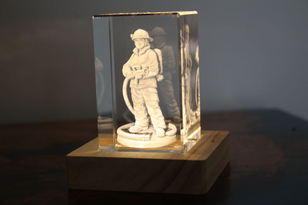 Firefighter crystal block glowing on an LED base